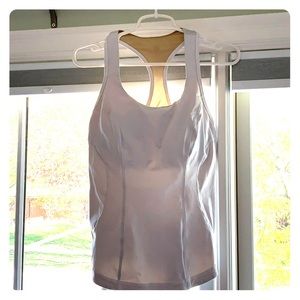 White lululemon workout top.